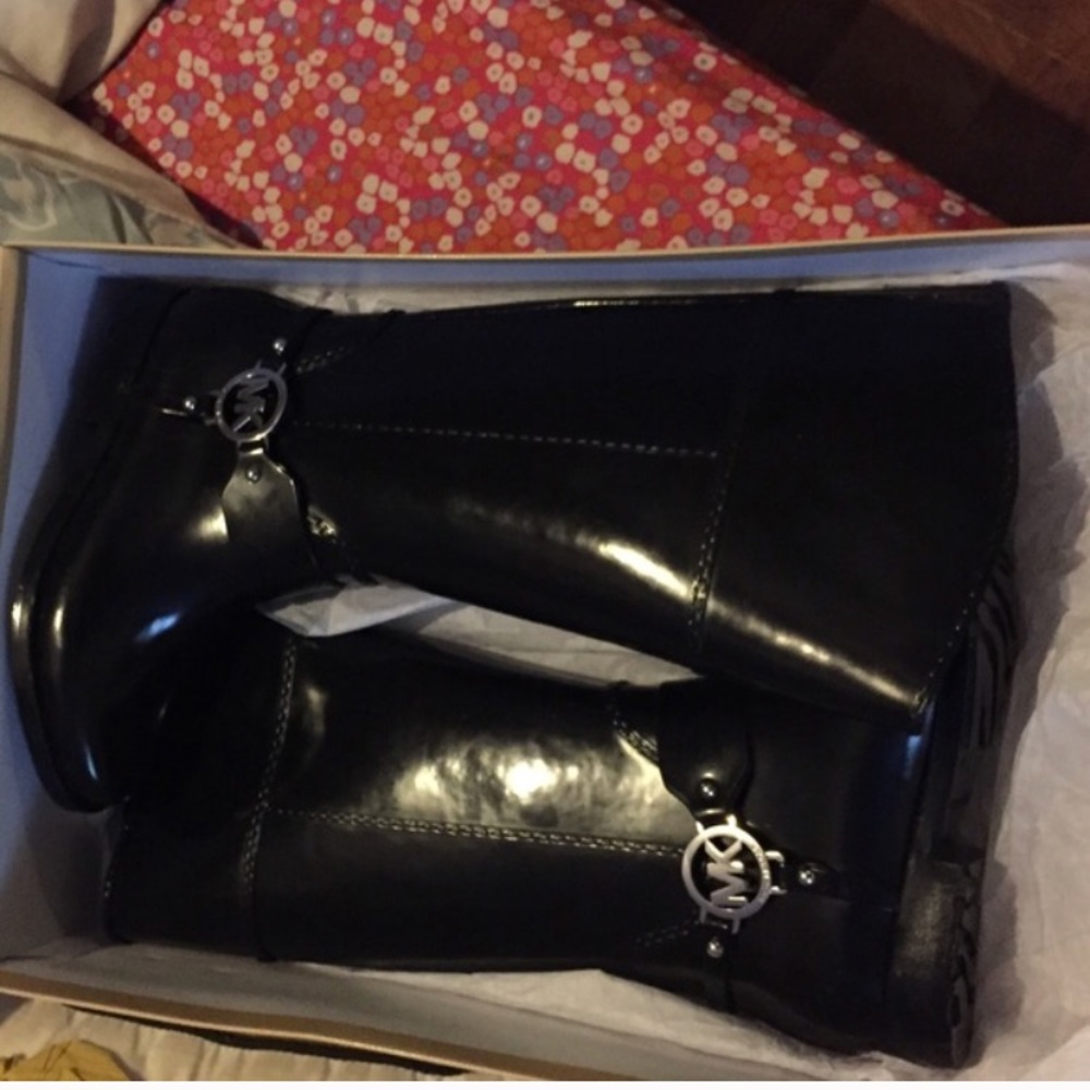 Michael Kors rain boots brand new condition.